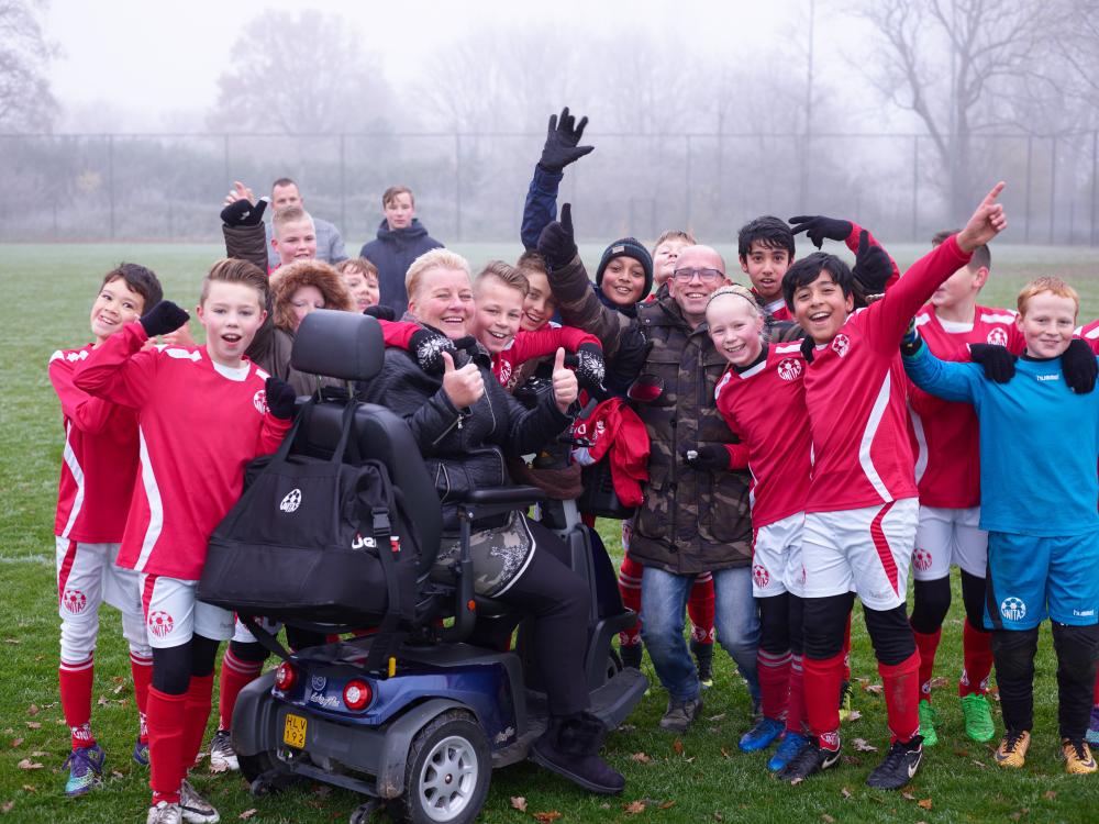 Marianne en haar voetbalteam